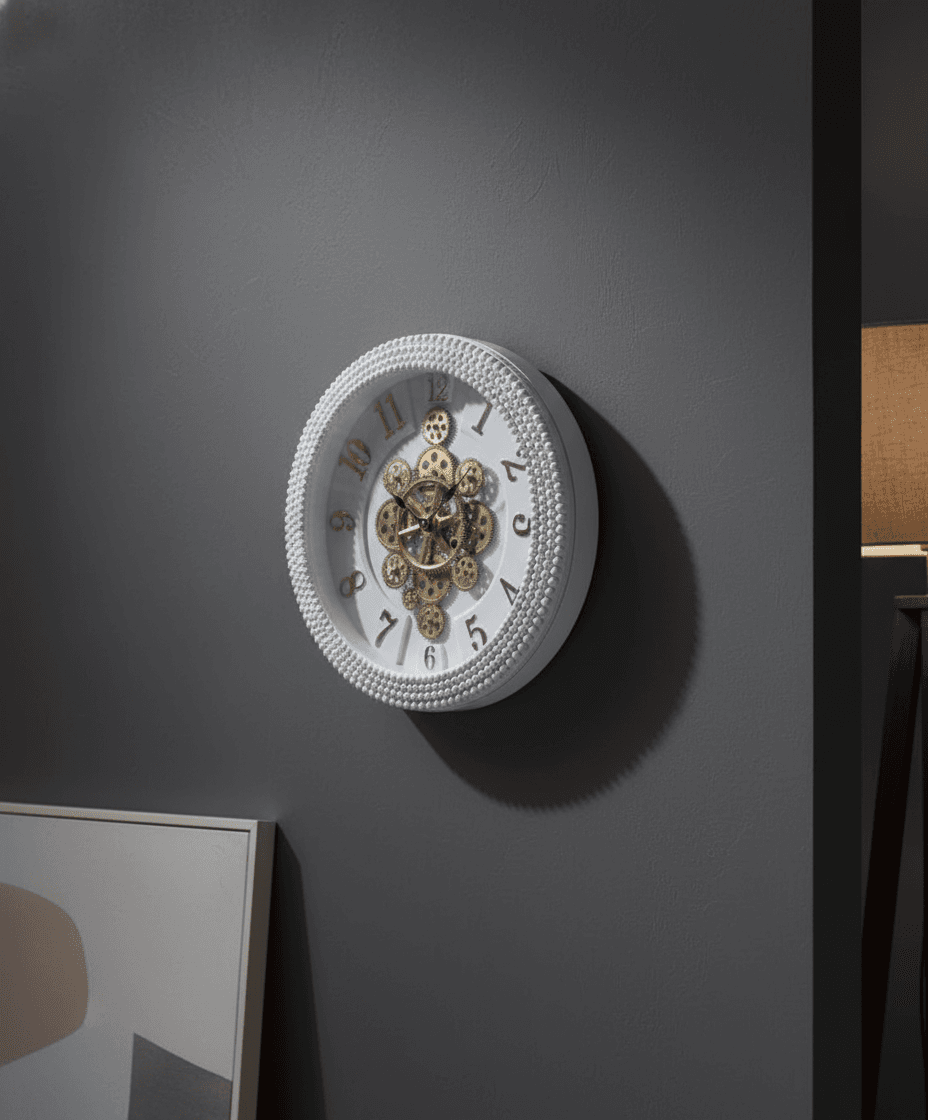 Ornate White Wall Clock With Visible Gears And Beaded Frame styled in a room setting 1