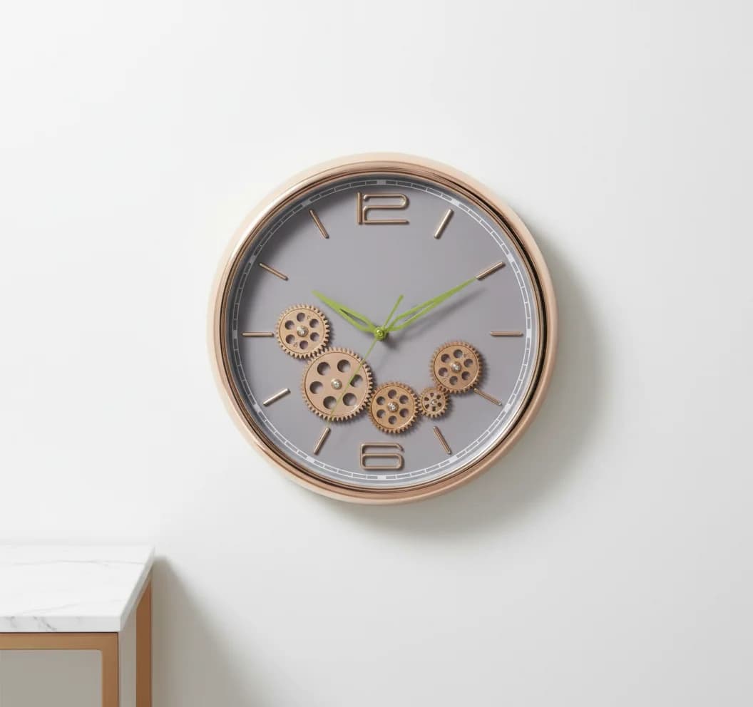 Striking Industrial Gear Wall Clock Champagne Gold styled in a room setting 3